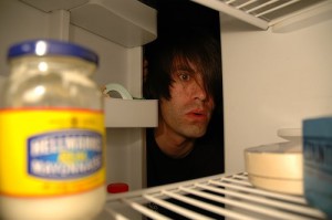 Peering into an empty fridge